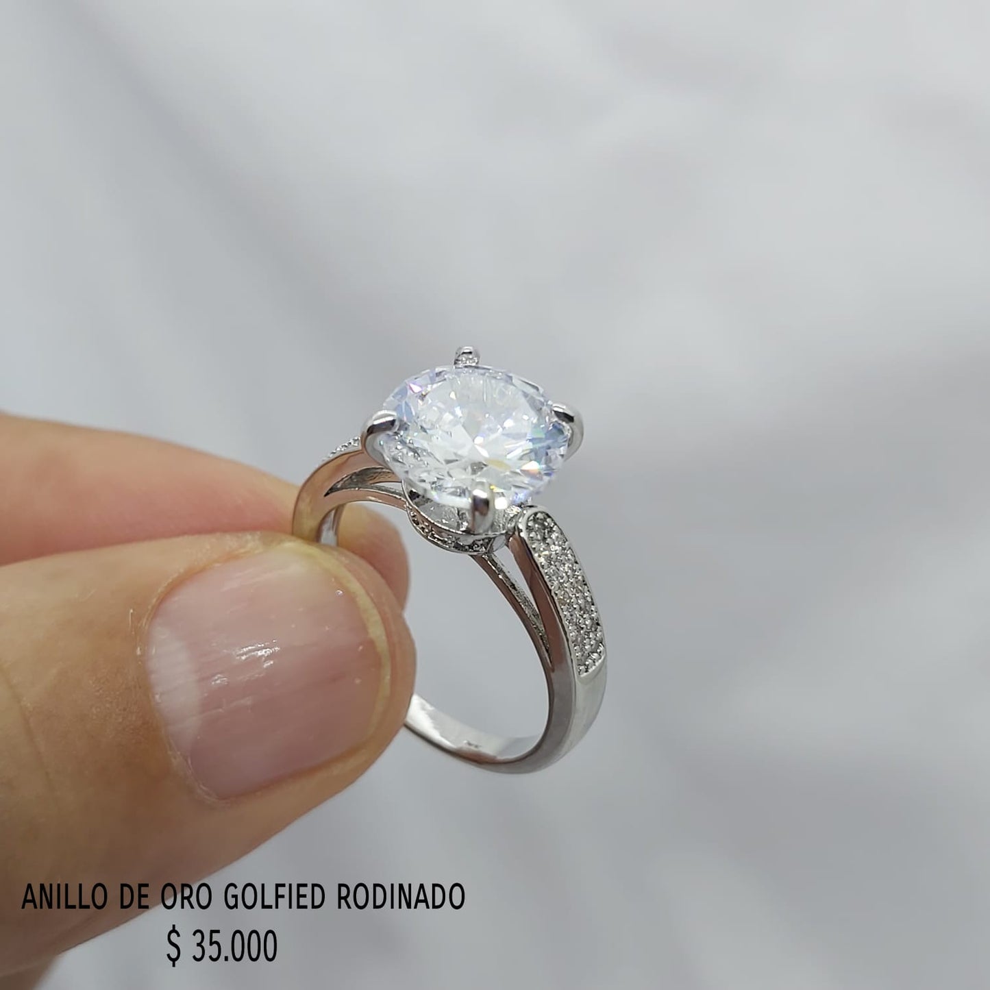 Anillo golfield rodinado con circónes