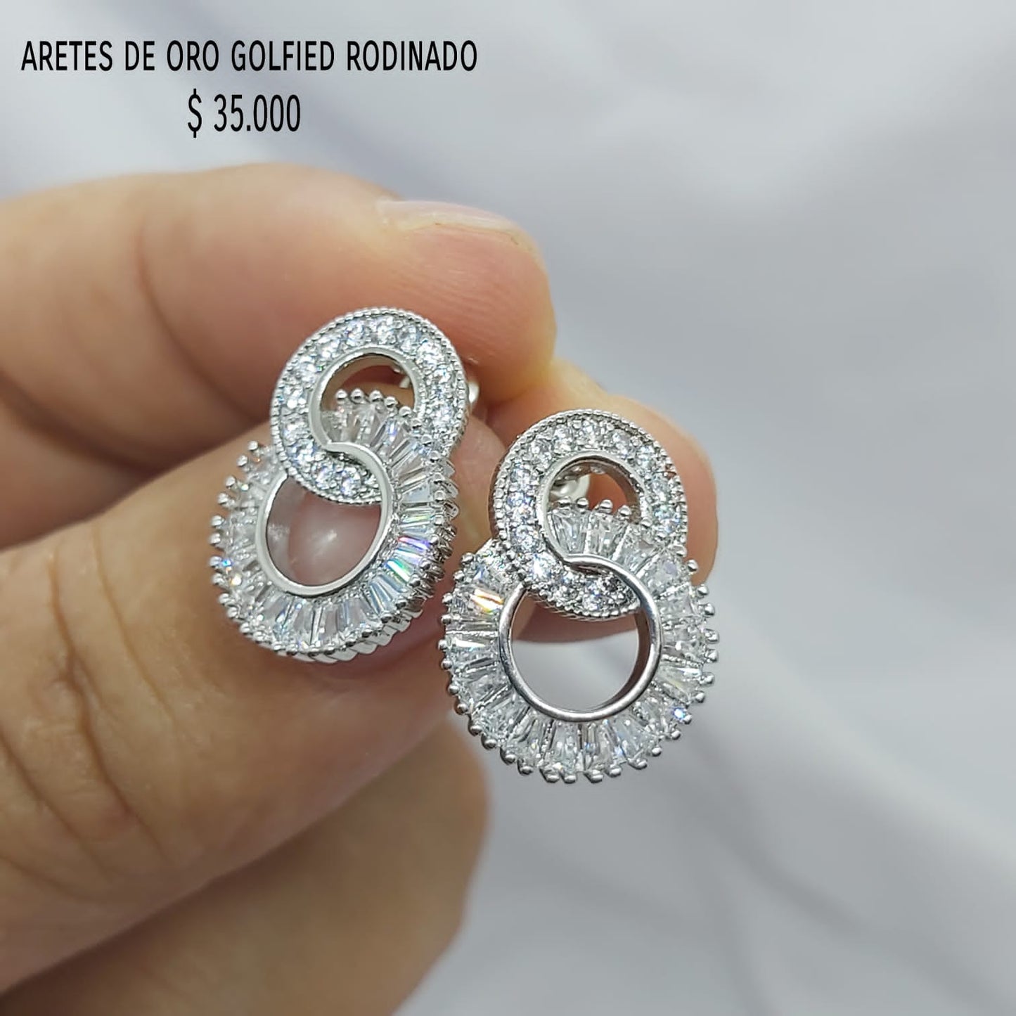 Aretes golfield rodinado con circónes