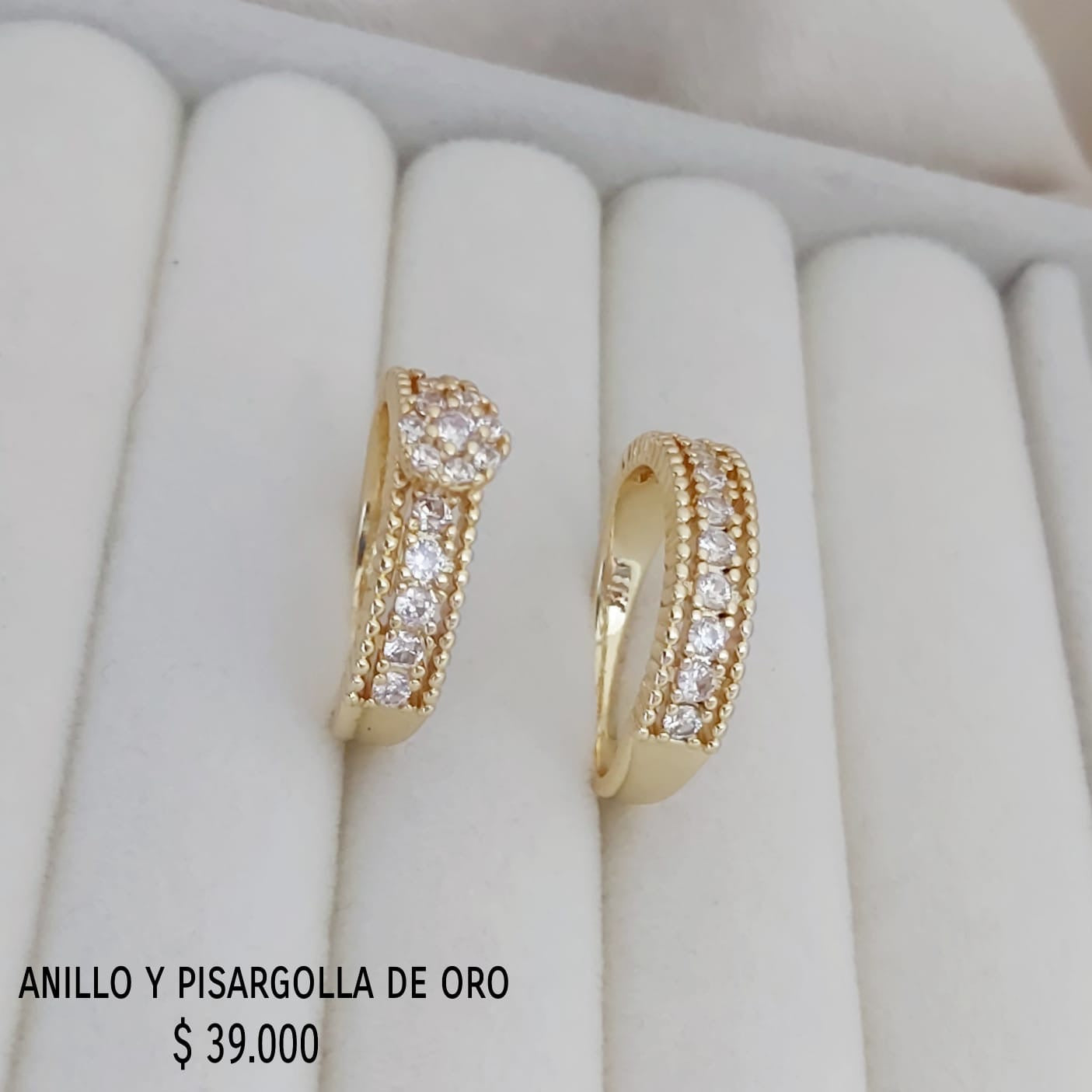 Anillo y pisargolla de oro golfield