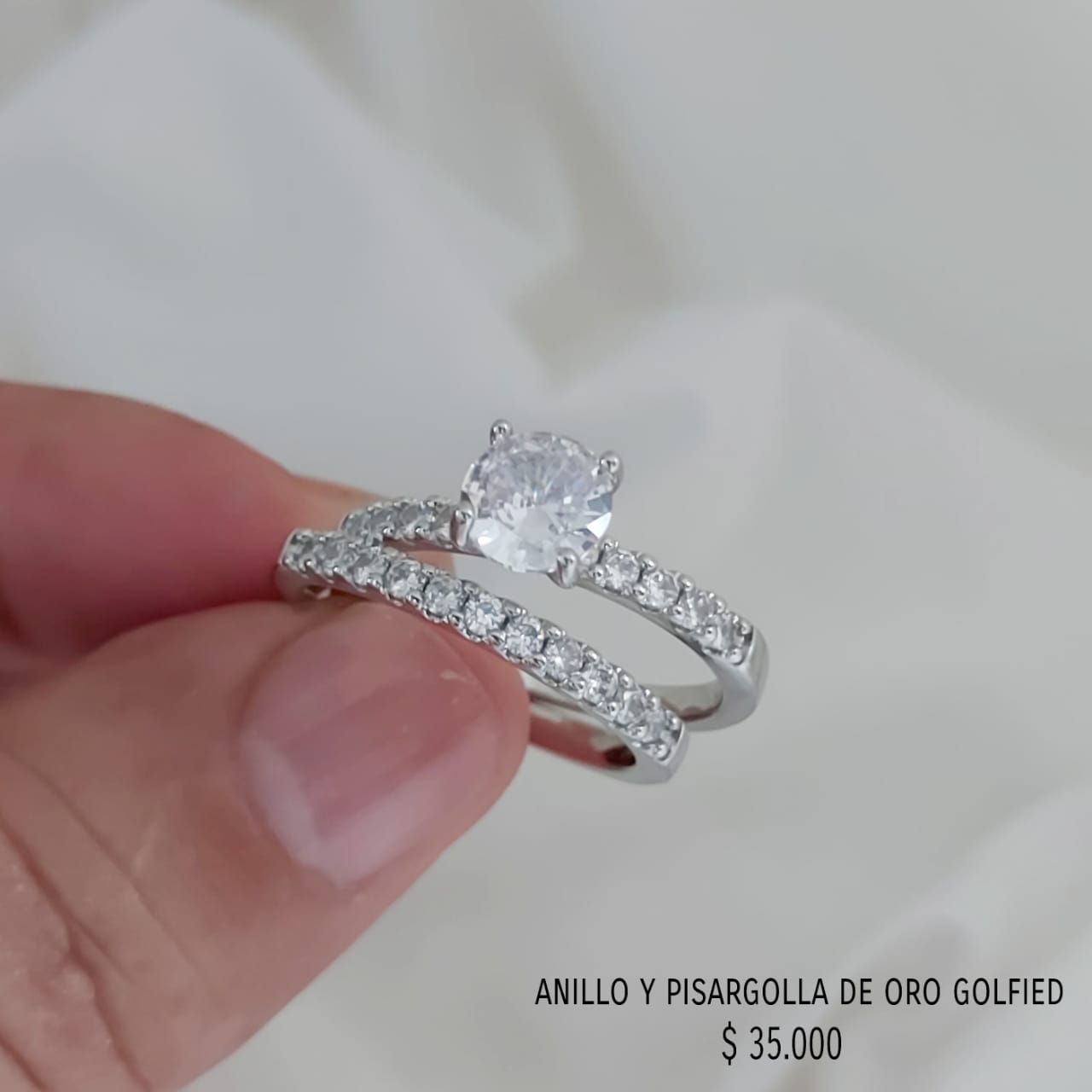 Anillo y pisargolla de oro Golfied