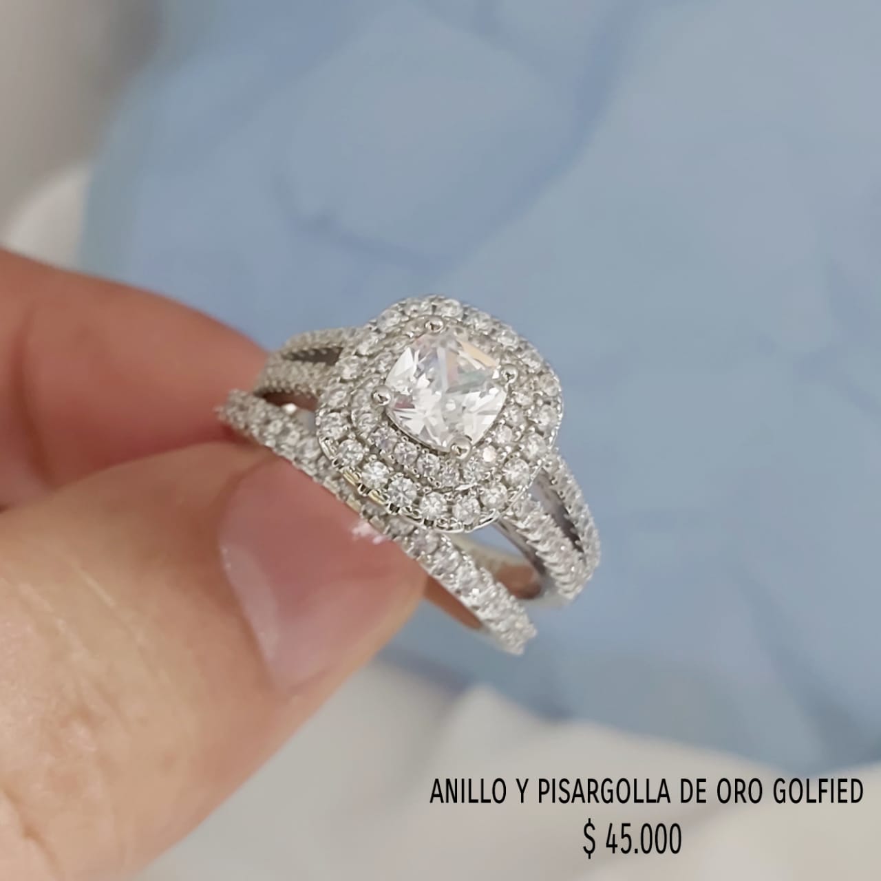 Anillo y pisargolla de oro golfield