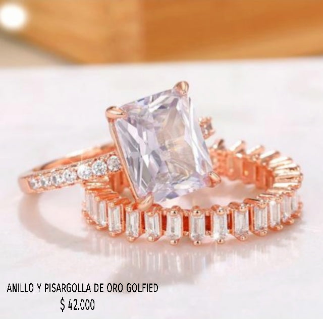 Anillo y pisargolla de oro golfield