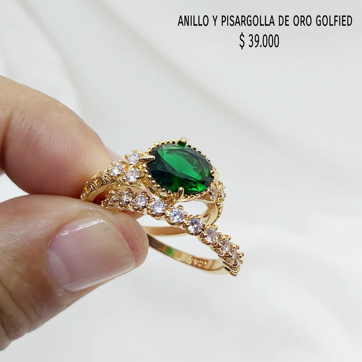 Anillo y pisargolla de oro golfield
