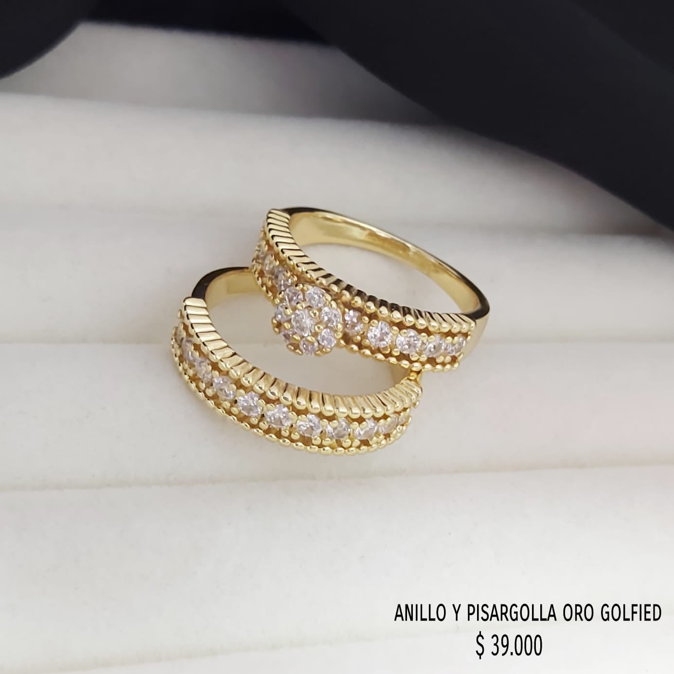 Anillo y pisargolla de oro golfield