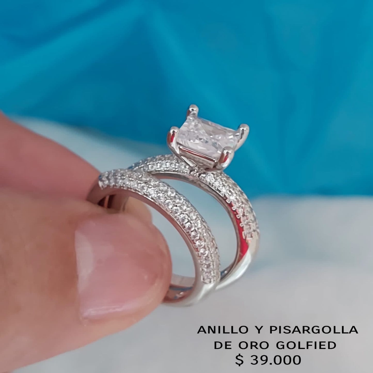 Anillo y pisargolla de oro golfield