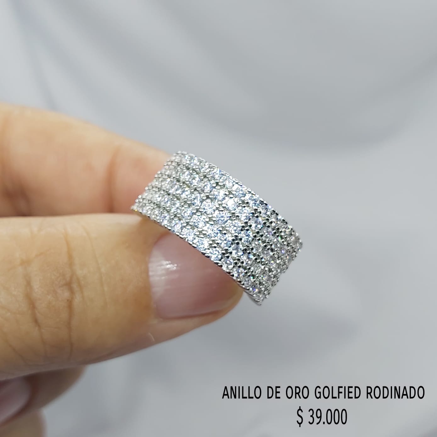 Anillo de oro golfield rodinado