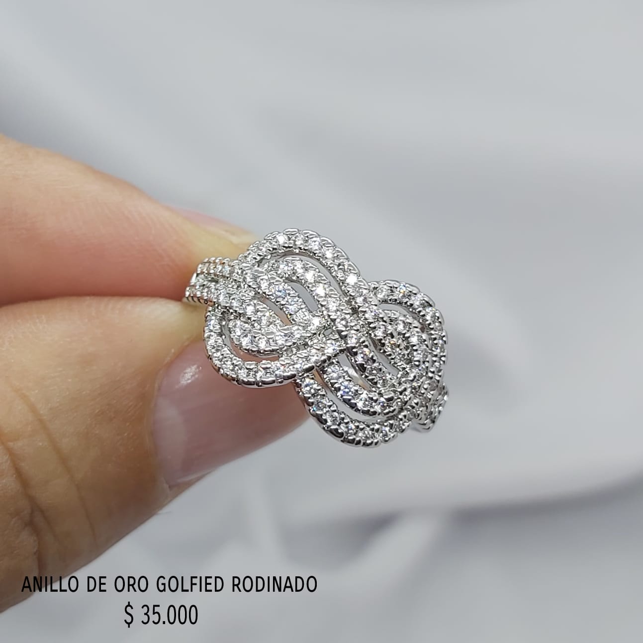 Anillo de oro golfield rodinado