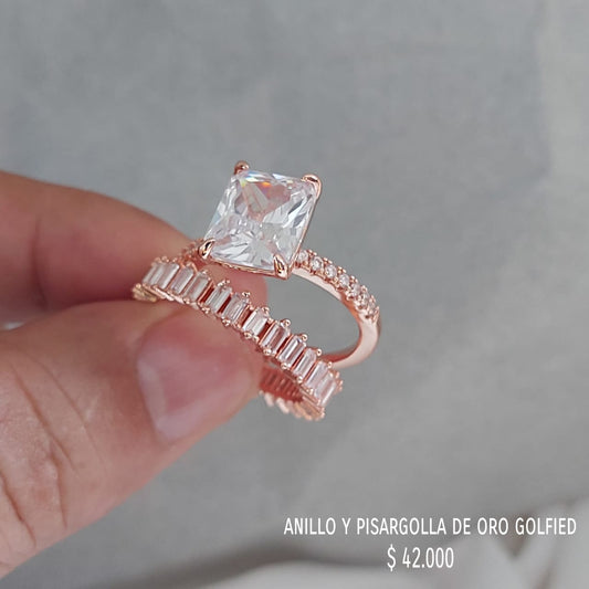 Anillo y pisargolla de oro golfield