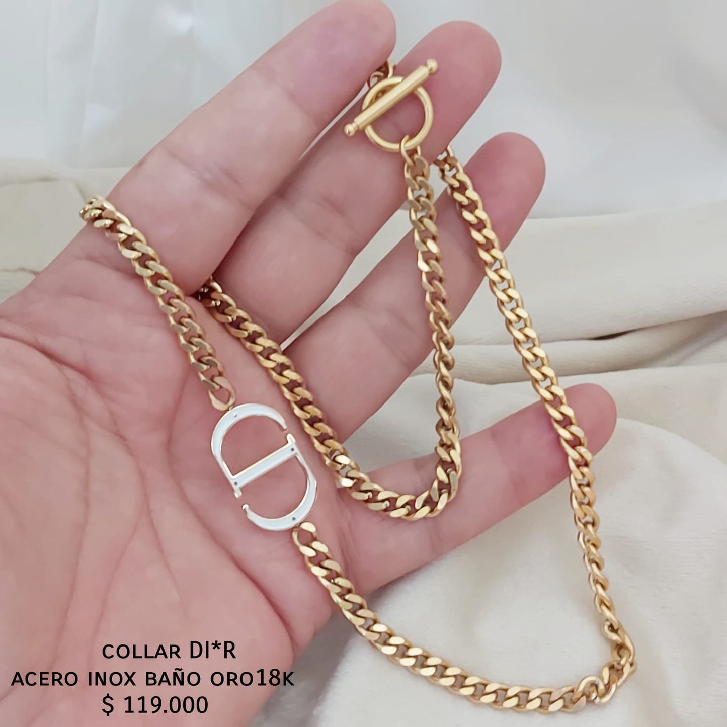 Collar DI*R acero inox baño de oro 18k