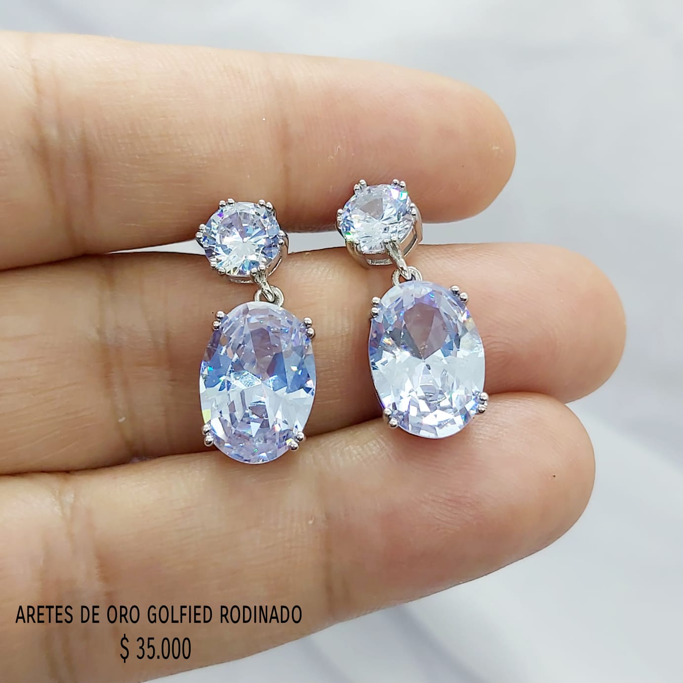 Aretes de oro golfield rodinado