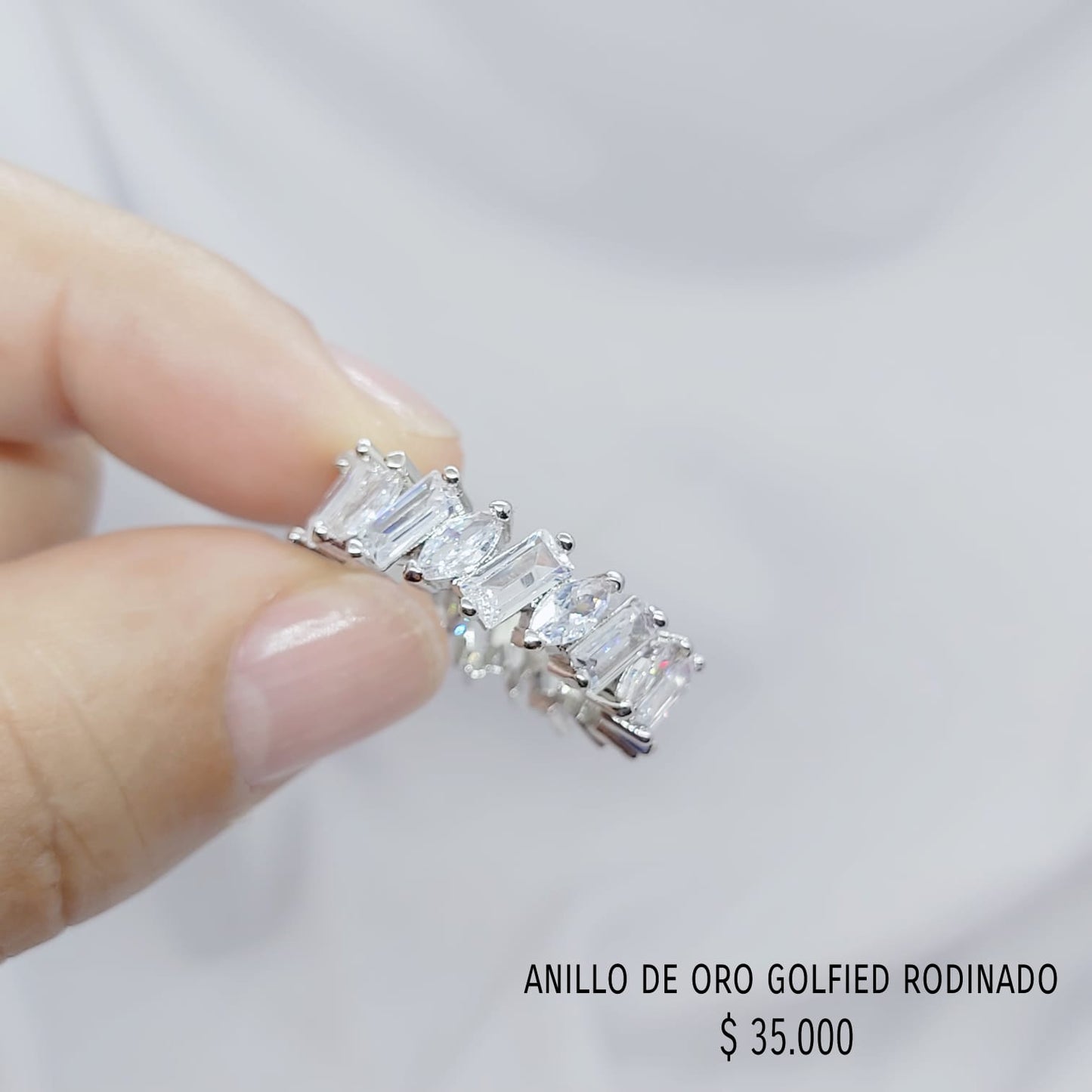 Anillo de oro golfield rodinado