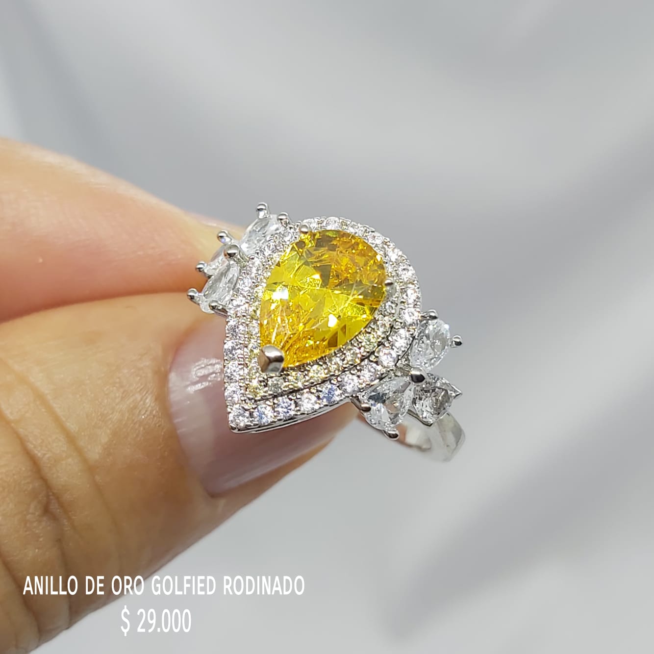 Anillo de oro golfield rodinado