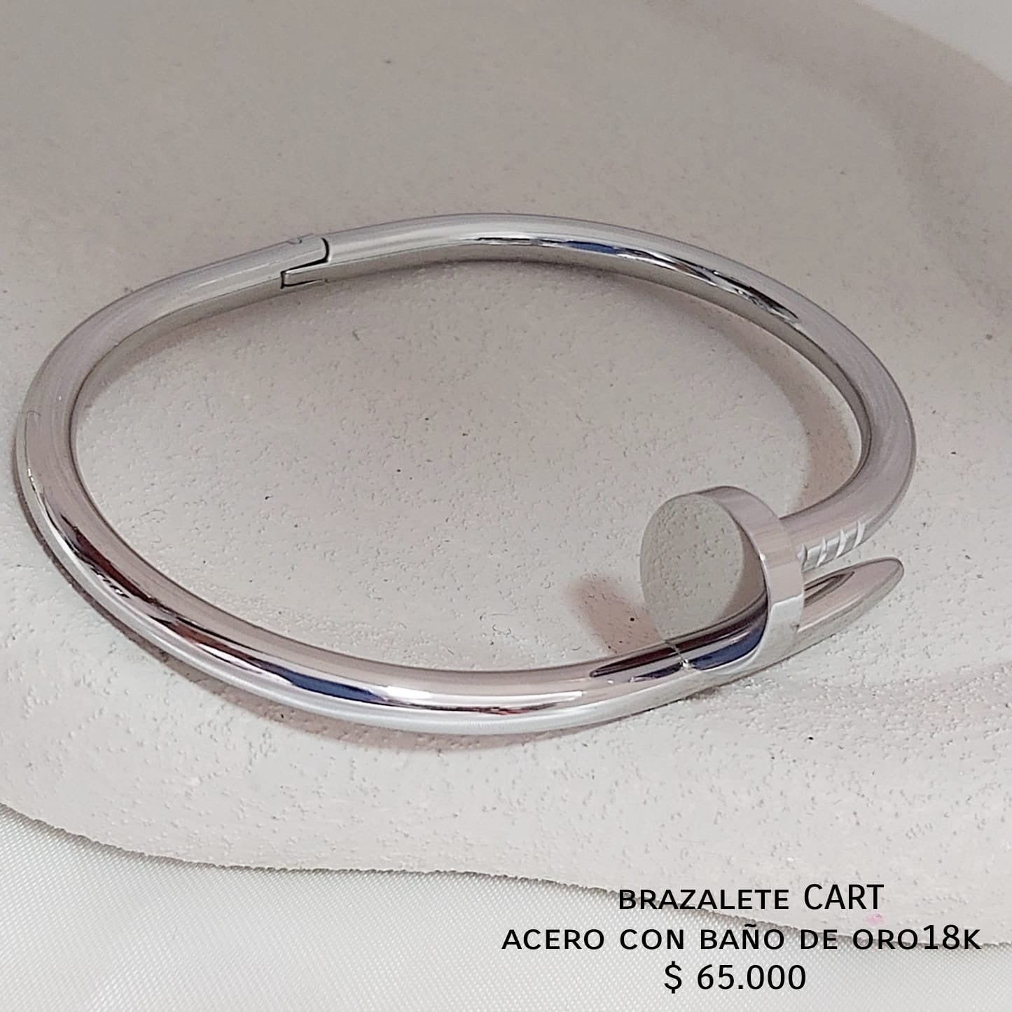 Brazalete CART de acero con baño de oro18k